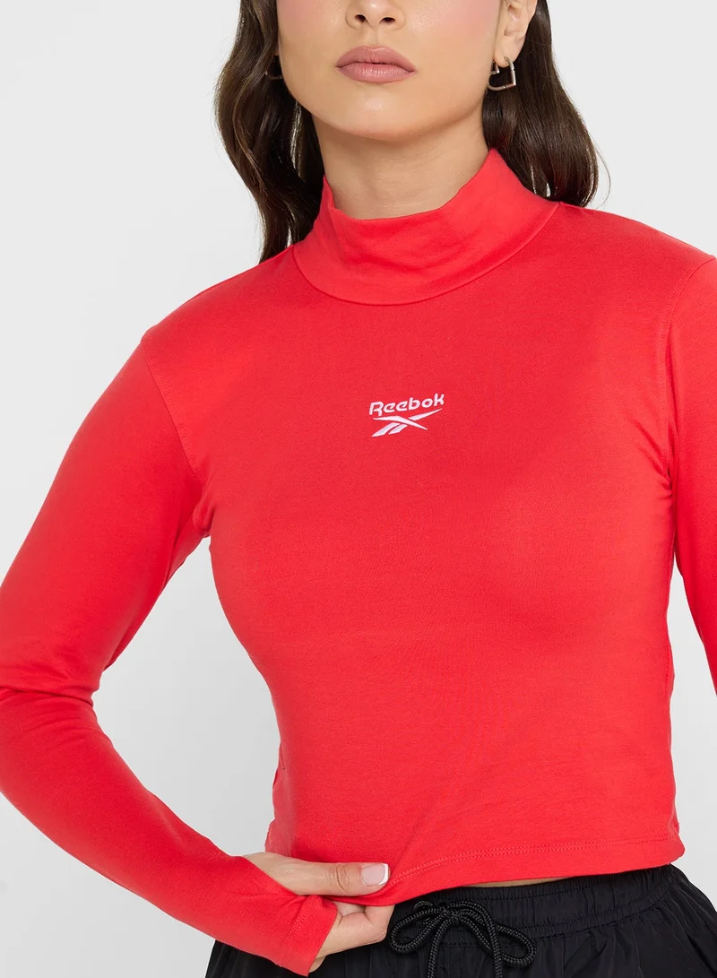 Reebok  Jade Roll Neck Slim Croped T-Shirt for Women | Best Price UAE