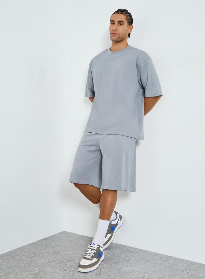 Styli Men Oversized Cut and Sew Panel T-Shirt and Shorts Co-Ords - Image 1