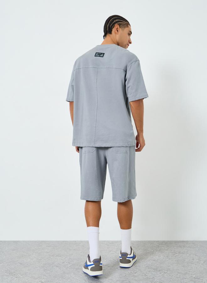 Styli Men Oversized Cut and Sew Panel T-Shirt and Shorts Co-Ords - Image 5