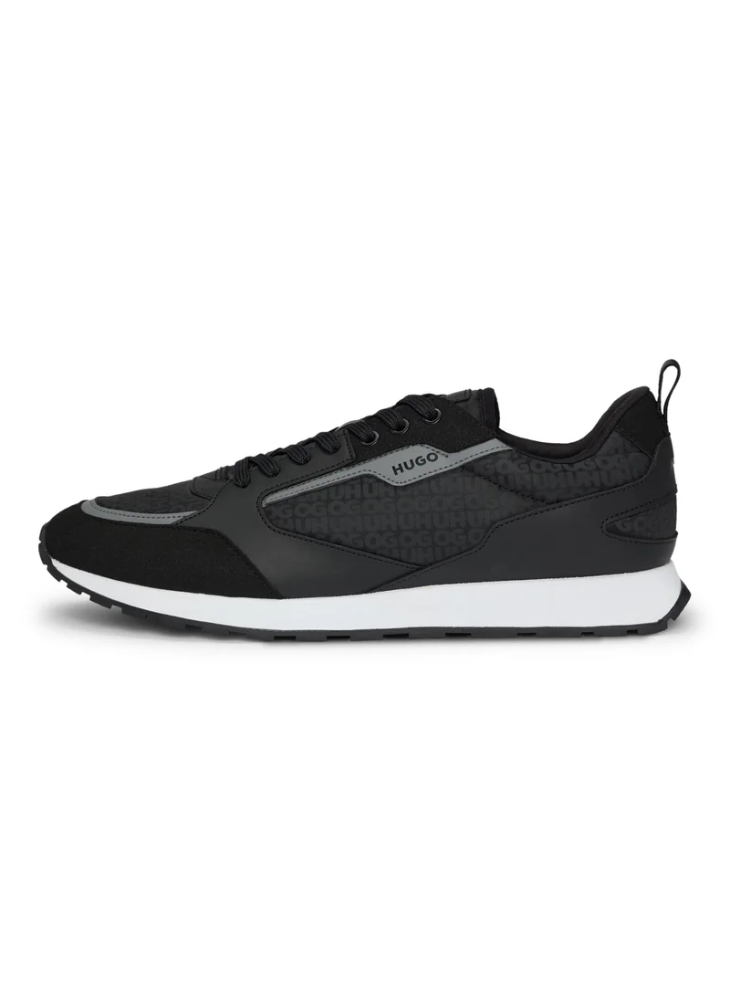 هوجو Mixed-material lace-up trainers with monogrammed upper