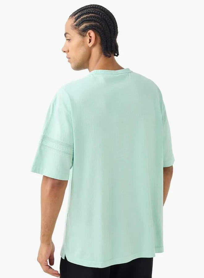 Kappa  Kappa Oversized T-shirt for Men | Best Price UAE