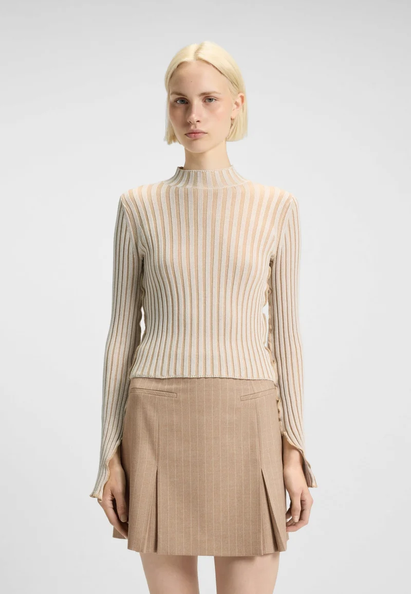 Mock-neck sweater in ribbed cotton with frilled seams