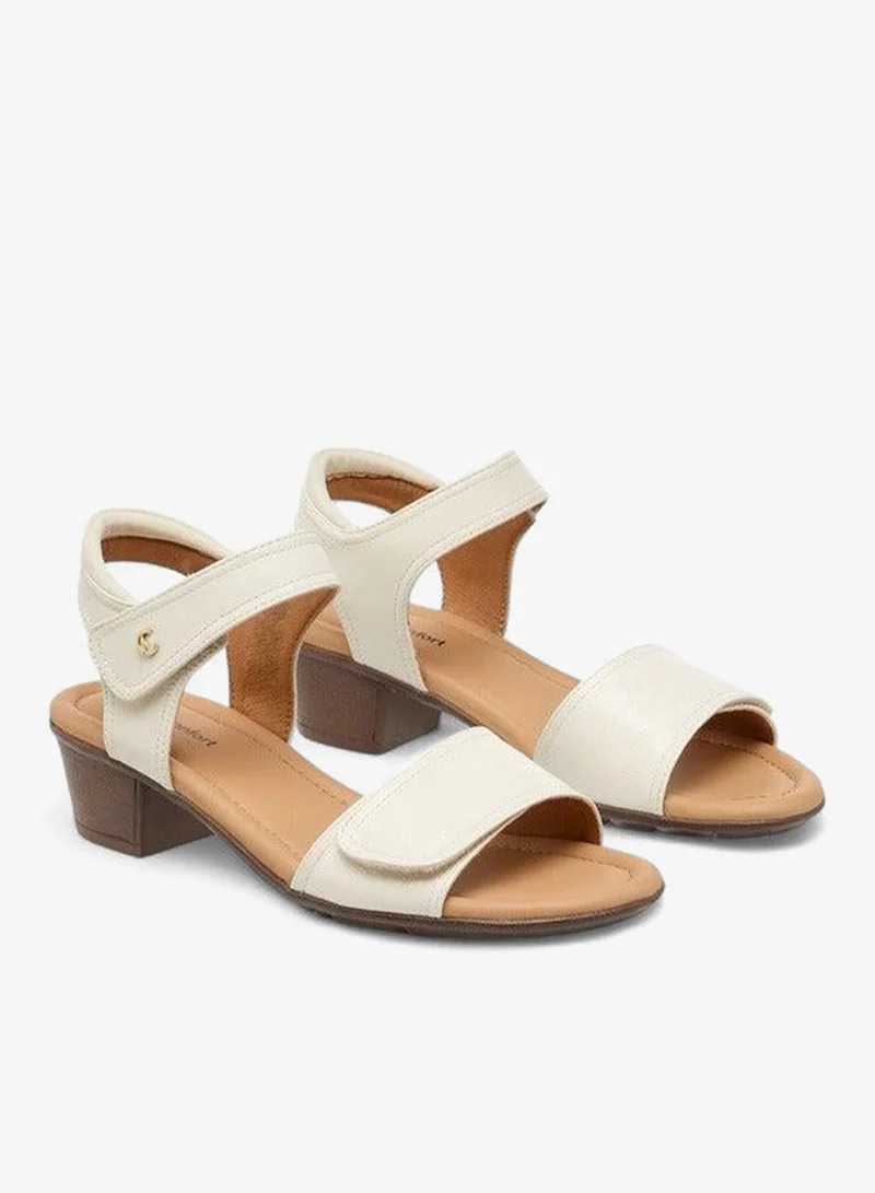 لو كونفورت صنادل نسائية بكعب عريض وإغلاق بشريط لاصق