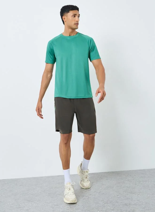 Styli Active Raglan Sleeve Core Athleisure T-Shirt with Back Print
