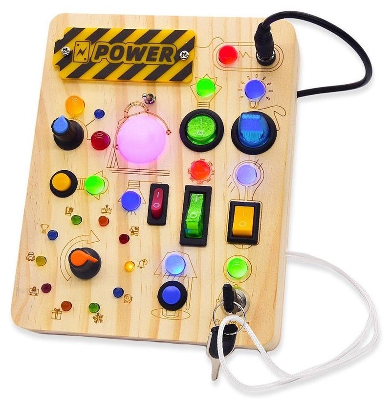 لوحة أنشطة مونتيسوري للأطفال الصغار، لوحة أنشطة خشبية للأطفال مع 23 مفتاح إضاءة LED، ألعاب حسية، ألعاب مفاتيح إضاءة، ألعاب سفر للأطفال الصغار والرضع من عمر سنة فما فوق - Image 1