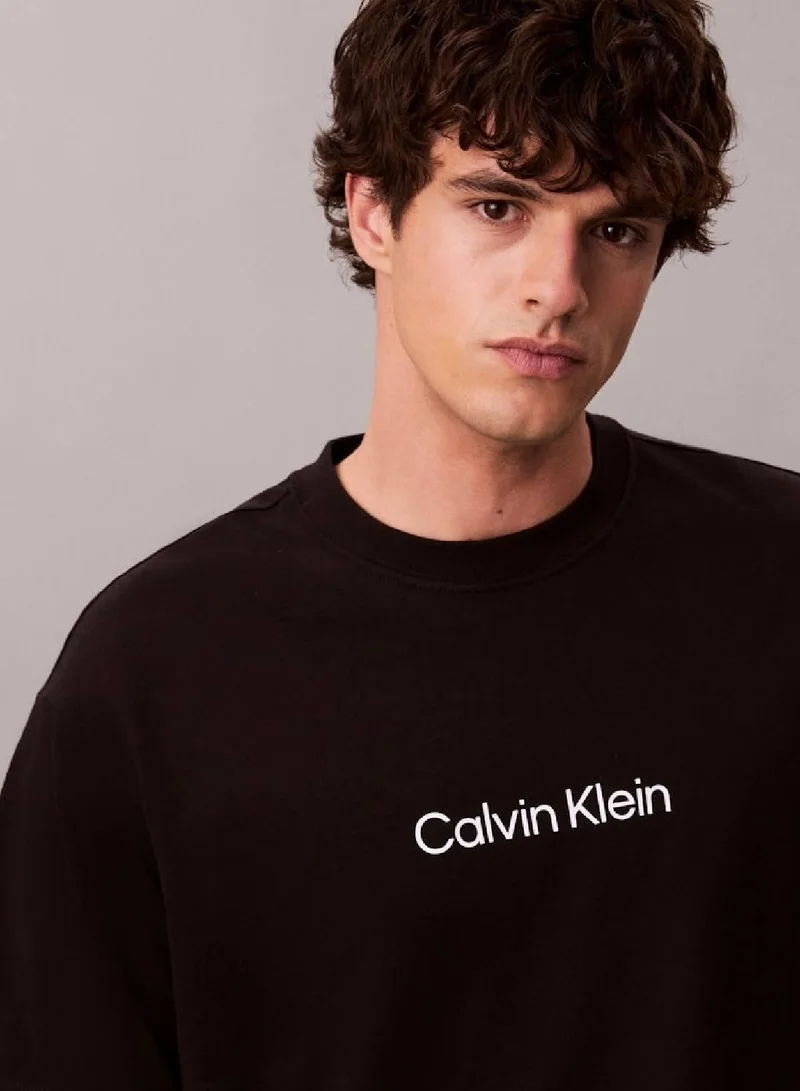 CALVIN KLEIN Black Standard Logo Relaxed Tee for Men | Best Price UAE