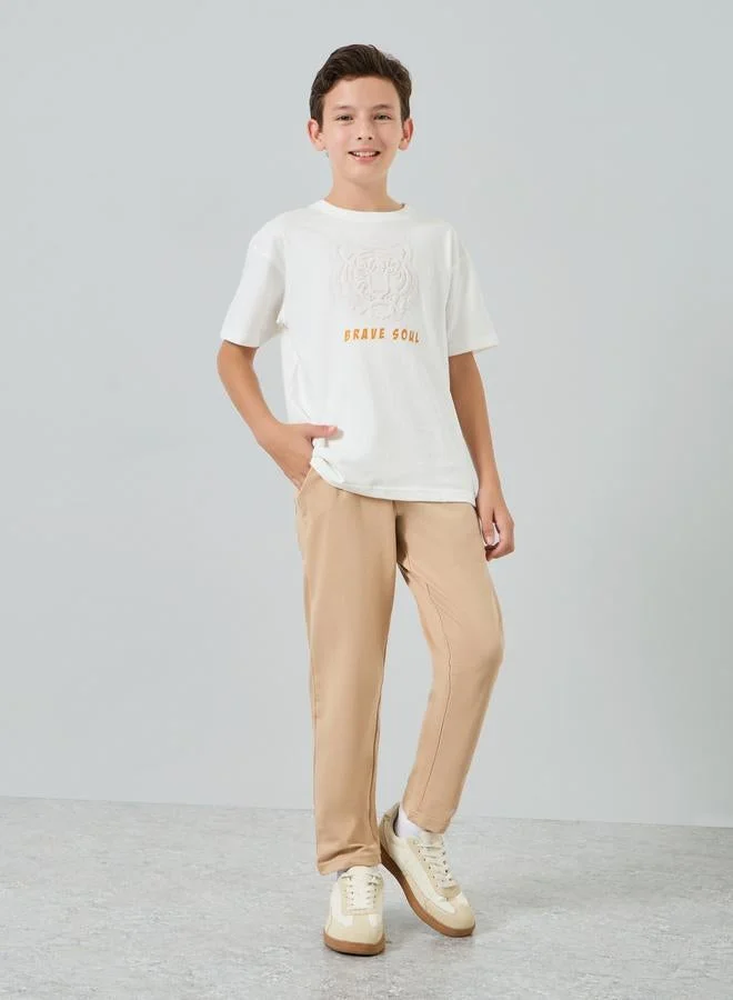 Styli Boys Off-White Embossed Print Oversized T-Shirt