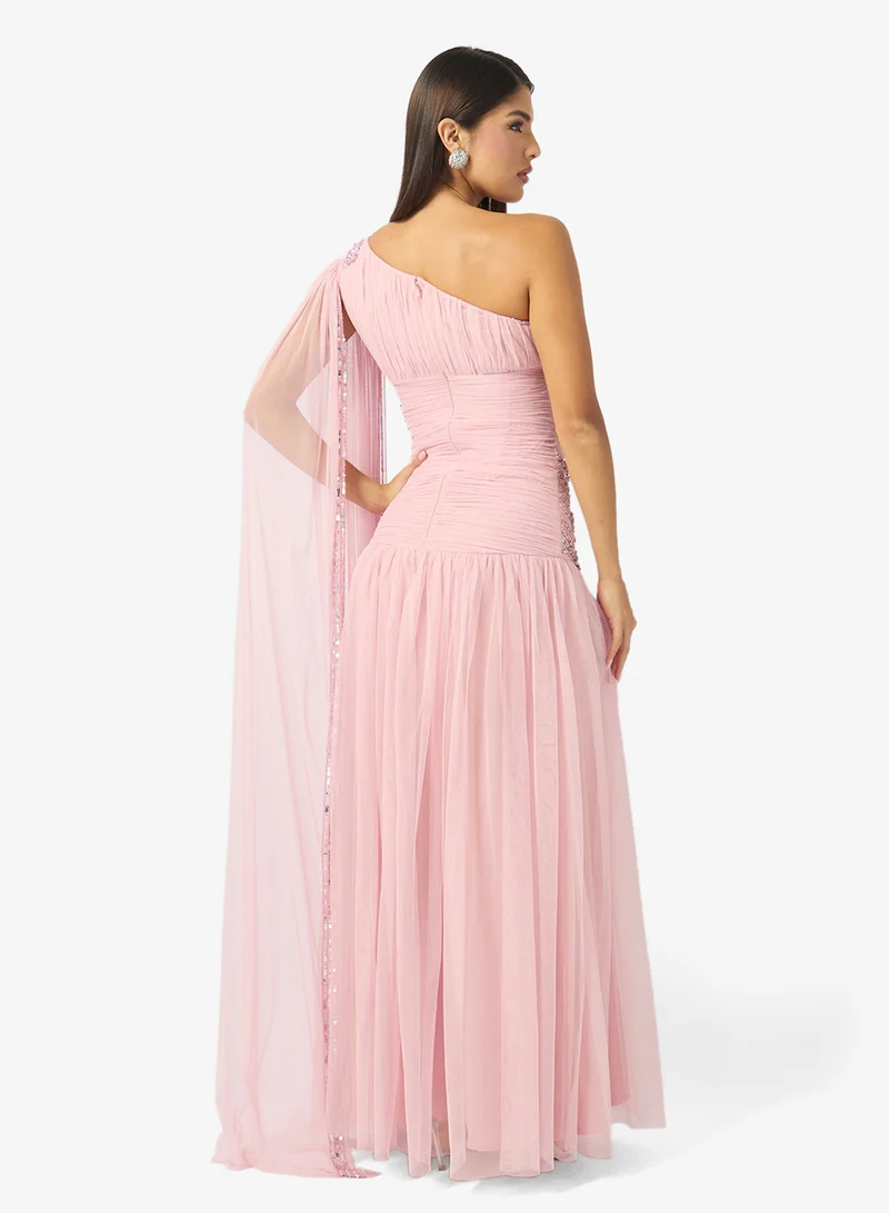 Namshi x One Shoulder Bead Embellished Evening Gown with Cape Sleeves