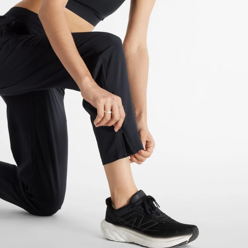 New Balance  Sport Essentials Performance Woven Pant for Women | Best Price UAE