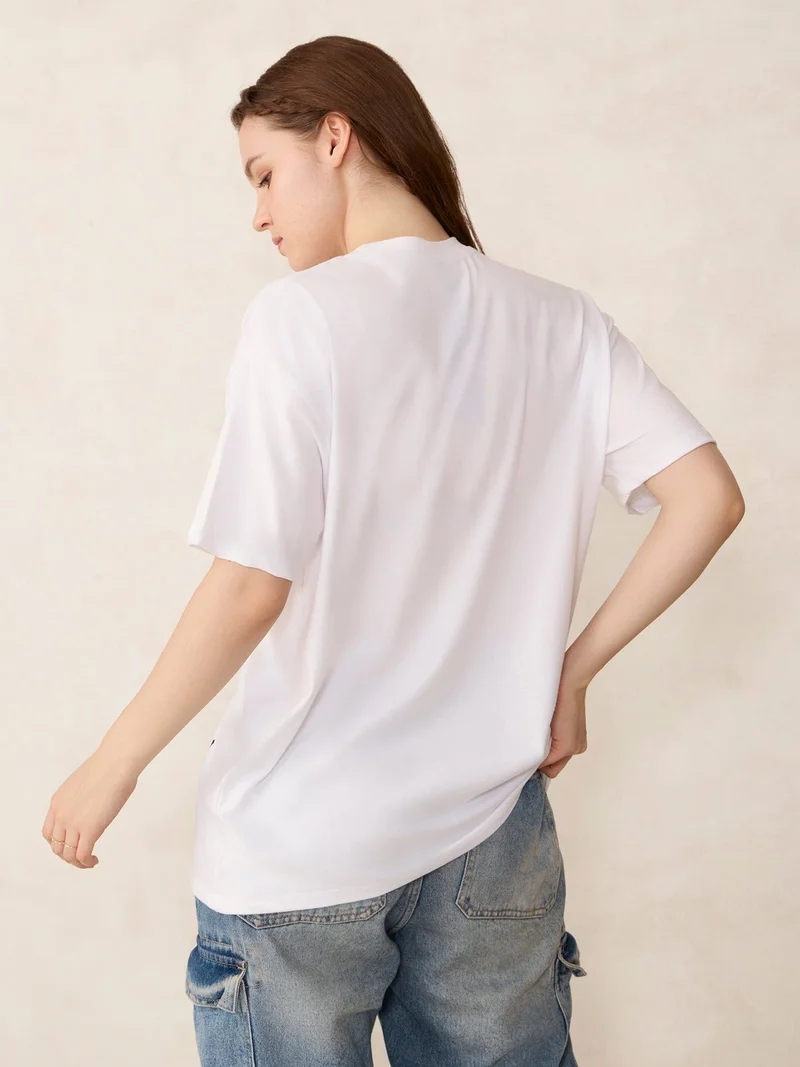 Outzidr white White Graphic Oversized T-Shirt for Women | Best Price UAE