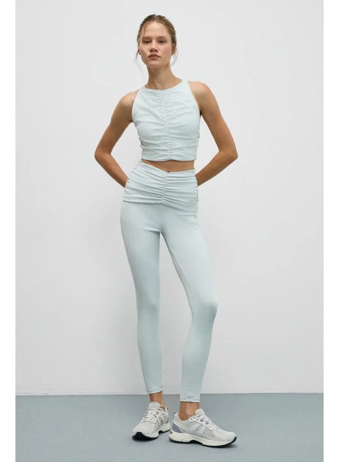 URBAN BEAT STRINVA Women's Elastic and Soft-Textured Gray Leggings with Ruched Waist.