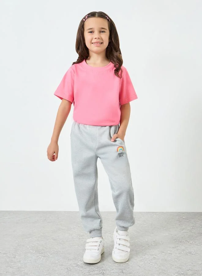 Styli Girls Grey Joggers with Rainbow Print