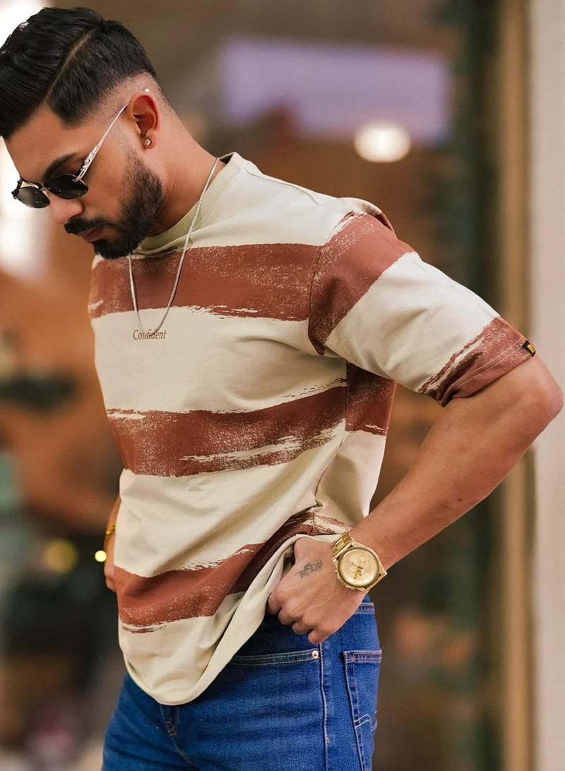 مانياك تيشيرت قطن مانياك رجالي مخطط برقبة دائرية وأكمام 3/4 بلون بسكويت وبني