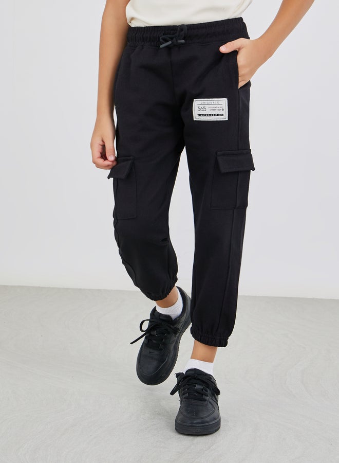 Styli Mid Rise Cargo Pocket Cuffed Joggers - Image 1