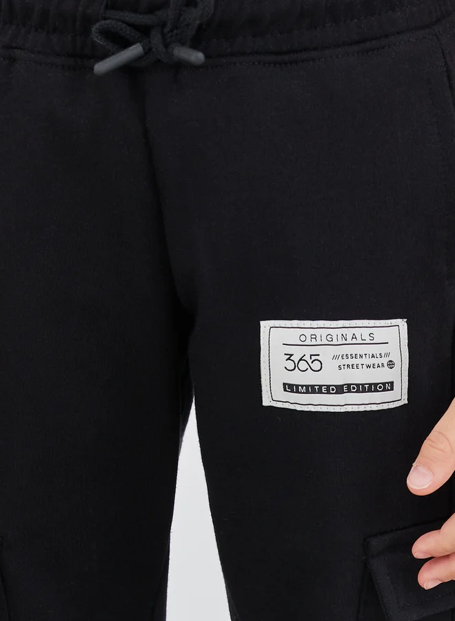 Styli Styli Mid Rise Cargo Pocket Cuffed Joggers