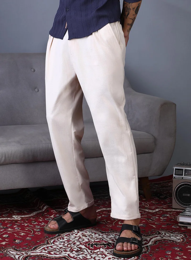 Campus Sutra Campus Sutra Men's Ecru White Cuffed Pleated Tailored Trousers For Casual Wear | Mid-Rise | Regular Fit | Button Closure | Trousers Crafted With Comfort Fit For Everyday Wear