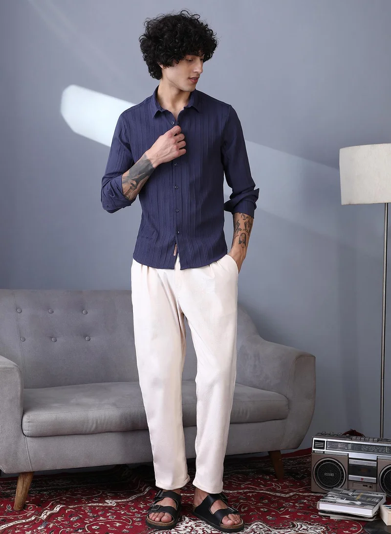Campus Sutra Campus Sutra Men's Ecru White Cuffed Pleated Tailored Trousers For Casual Wear | Mid-Rise | Regular Fit | Button Closure | Trousers Crafted With Comfort Fit For Everyday Wear