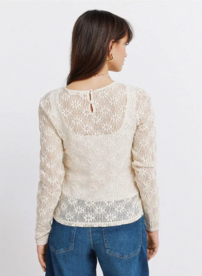 Springfield  Jersey-knit sheer floral border print funnel neck back-buttoned long sleeve T-shirt for Women | Best Price UAE