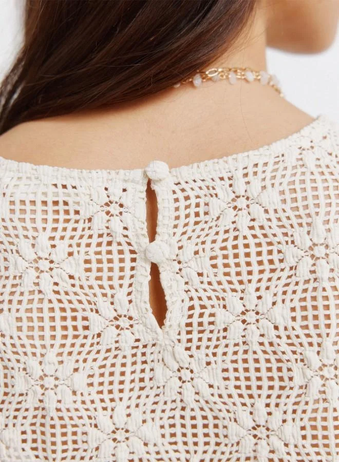 Springfield  Jersey-knit sheer floral border print funnel neck back-buttoned long sleeve T-shirt for Women | Best Price UAE