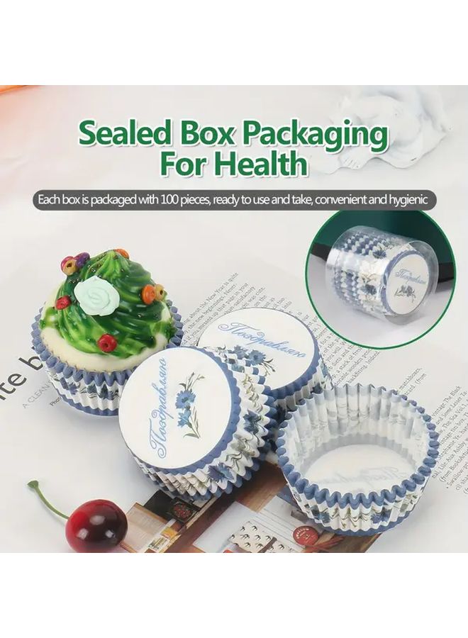 100 قطعة من أكواب الحلوى الورقية متعددة الألوان بتصميم القرنفل الأزرق، وصواني الكيك المقاومة للزيوت - Image 1