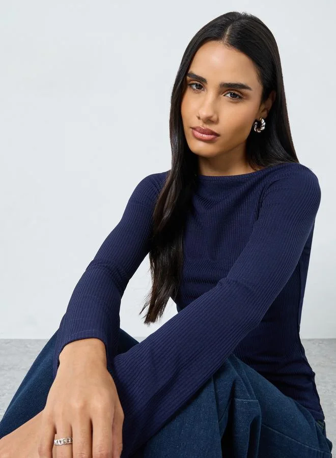 Styli Styli Ribbed Knit Flared Long Sleeve Top