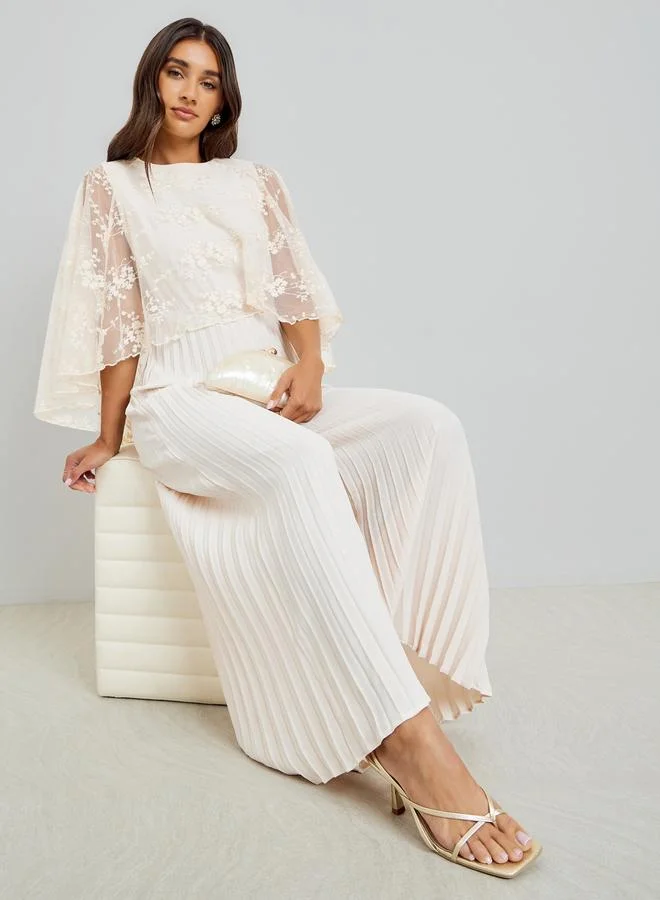 Styli Cream Cape Sleeve Wide Leg Pleated Jumpsuit
