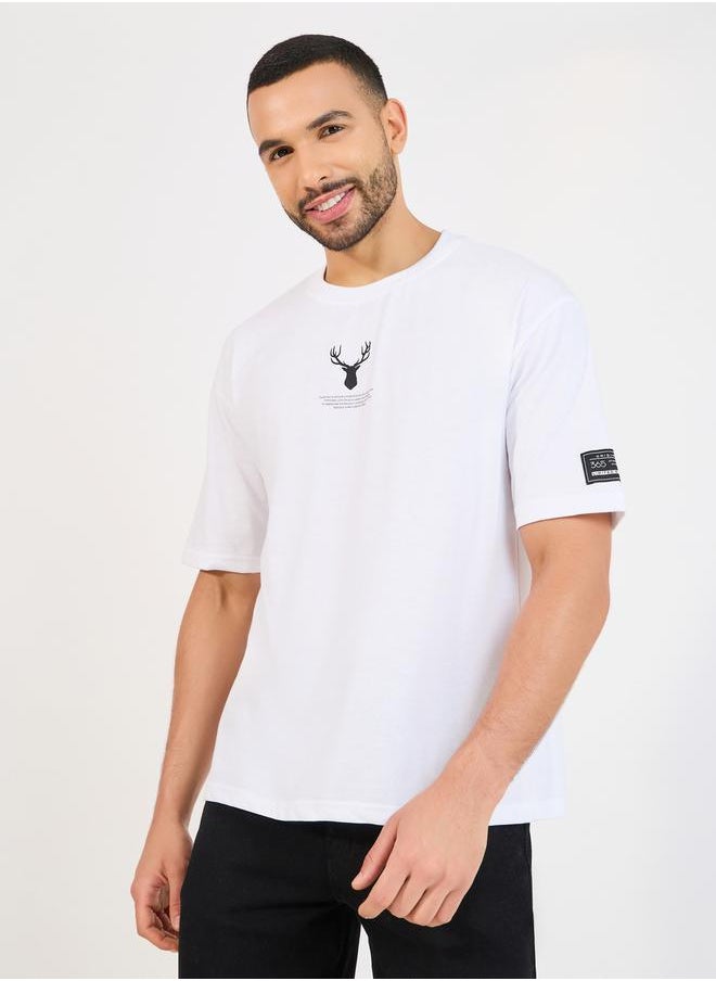 Styli Reindeer Graphic Oversized T-Shirt with Sleeve Badge  - Image 1