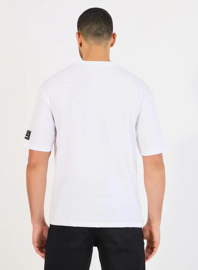 Styli Reindeer Graphic Oversized T-Shirt with Sleeve Badge
