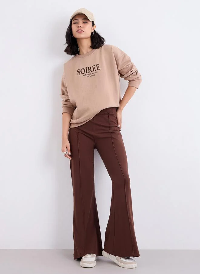 ستايلي بنطال محبوك واسع من الأسفل