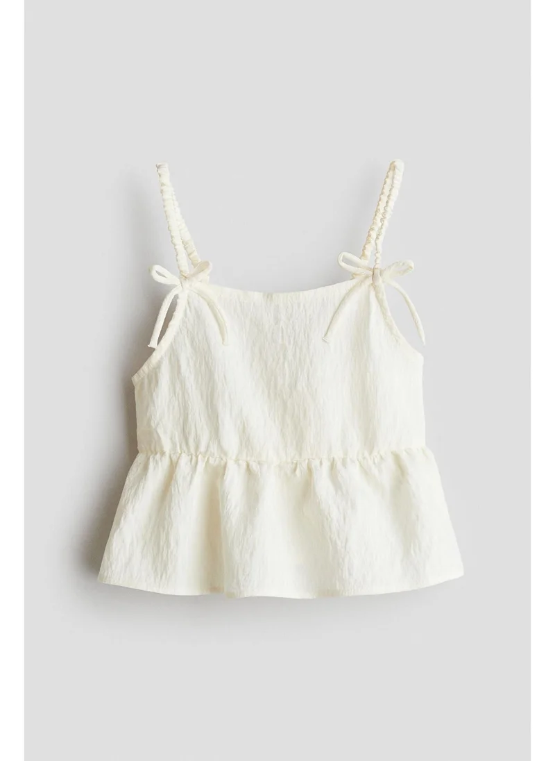 H&M Bow-detail peplum top