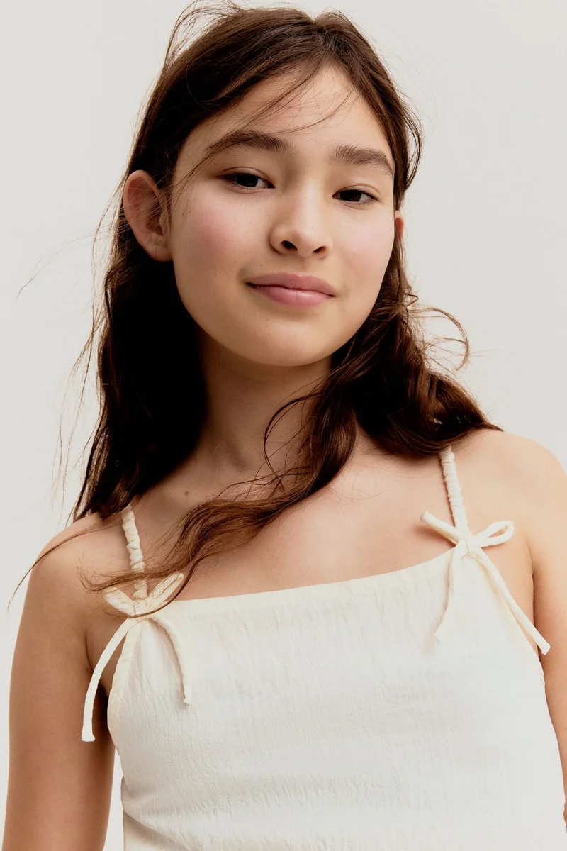 H&M Bow-detail peplum top