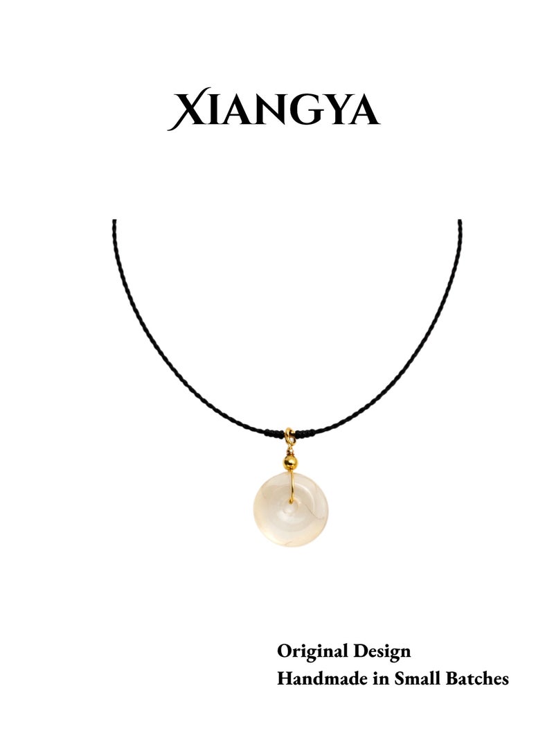 XIANGYA Round Jade Pendant Necklace – Minimalist Translucent Stone Charm with Adjustable Black Cord - Image 1
