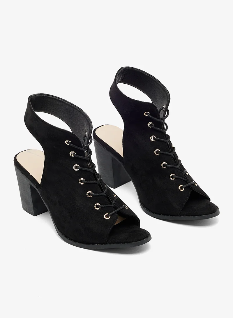 جينجر صنادل بكعب إسفيني