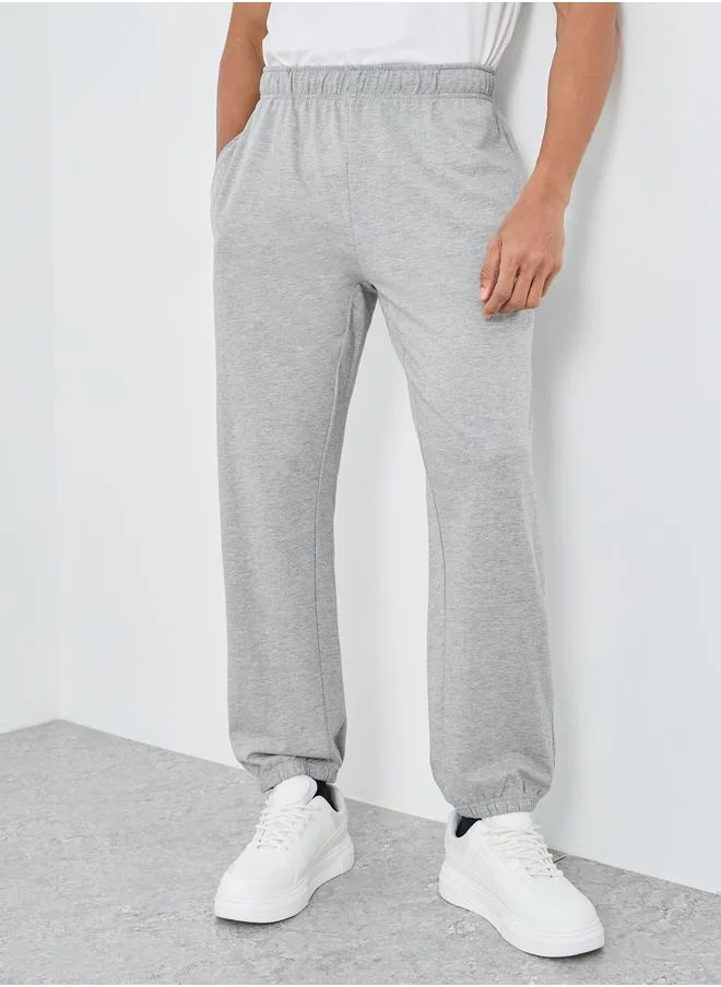 ستايلي Styli Pack of 2 - Solid Terry Relaxed Fit Elasticated Cuff Joggers
