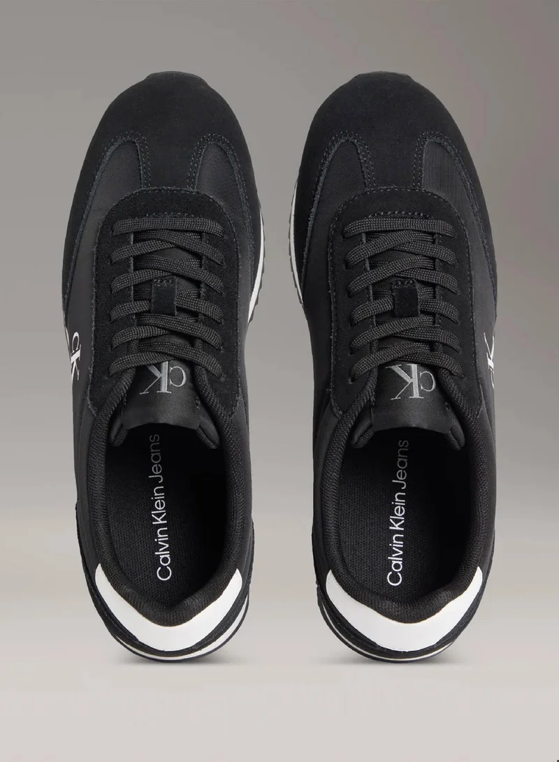 Calvin Klein Jeans Black/Bright White Leather Trainers for Women | Best Price UAE