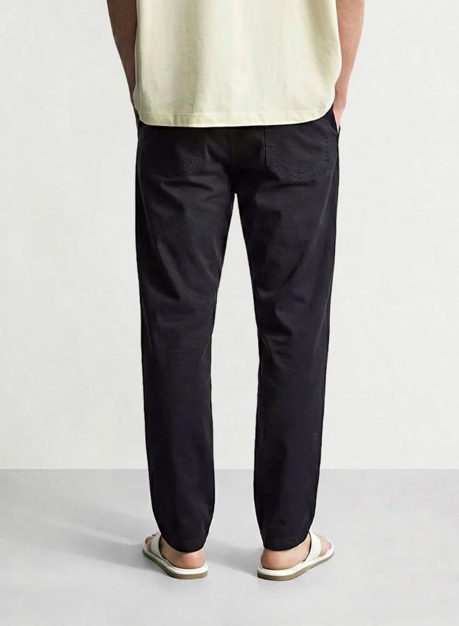 ذا انديان كراج كو Men Regular Fit Solid Cross Pocket Mid-Rise Trousers