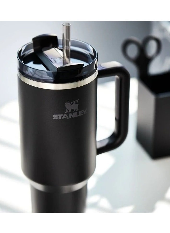 Stanley - Quencher H2.0 FlowState Vacuum Insulated Tumbler – 40 oz Black Stainless Steel Travel Mug with Leakproof Lid and Reusable Straw – Double-Walled, Durable & BPA-Free – Keeps Drinks Hot for 7 Hours or Cold for 24 Hours – Eco-Friendly, Portable & Ideal for Work, Gym, or Travel - Image 1