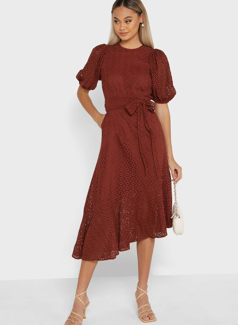 sheer sequin asymmetric cut out mini dress in pistachio Ted Baker | Jillia asymmetric tie midi dress in dark navy main image 0