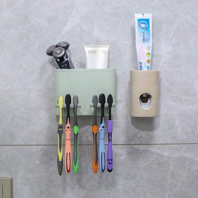 SELF ADHESIVE WALL MOUNTED TOOTHBRUSH HOLDER WITH AUTOMATIC WALL MOUNTED TOOTHPASTE DISPENSER SQUEEZER 2 SLOT FOR KEEPING CREAM LOTION SHAMPOO SHAVING MACHINE WITH 6 TOOTHBRUSH HOLDER HOOK