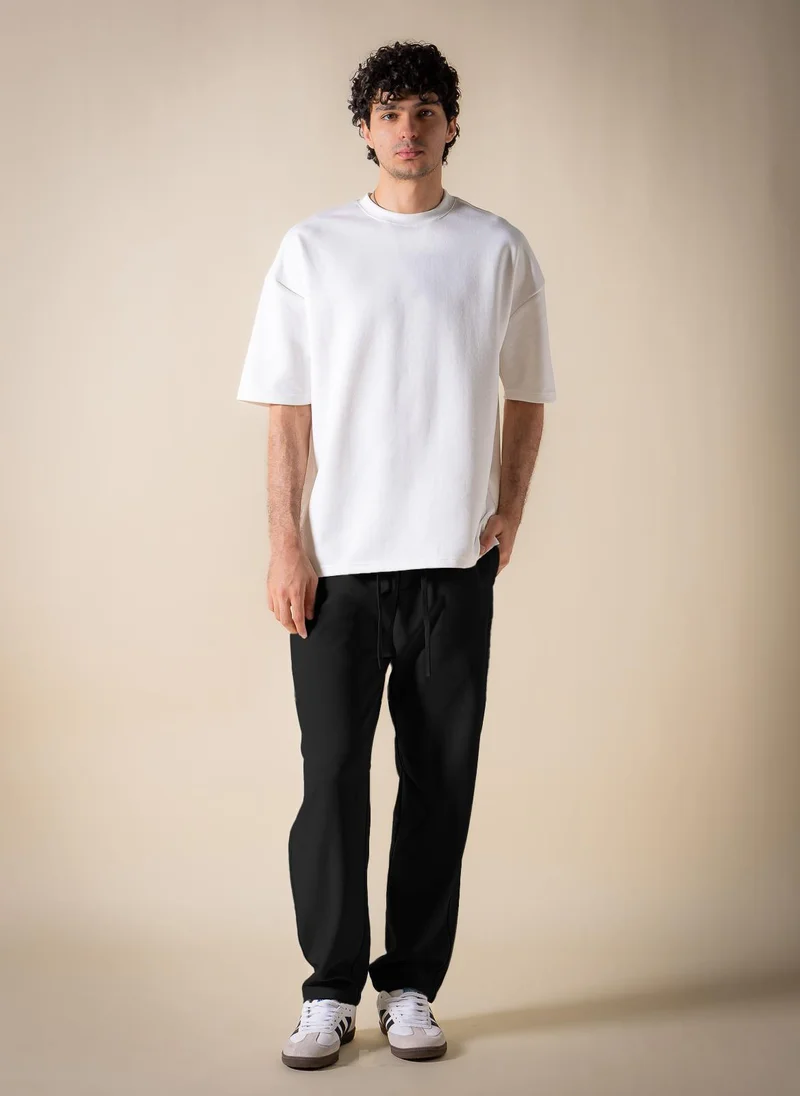 SHAPES TEXTURED JOGGER-WAIST TROUSERS