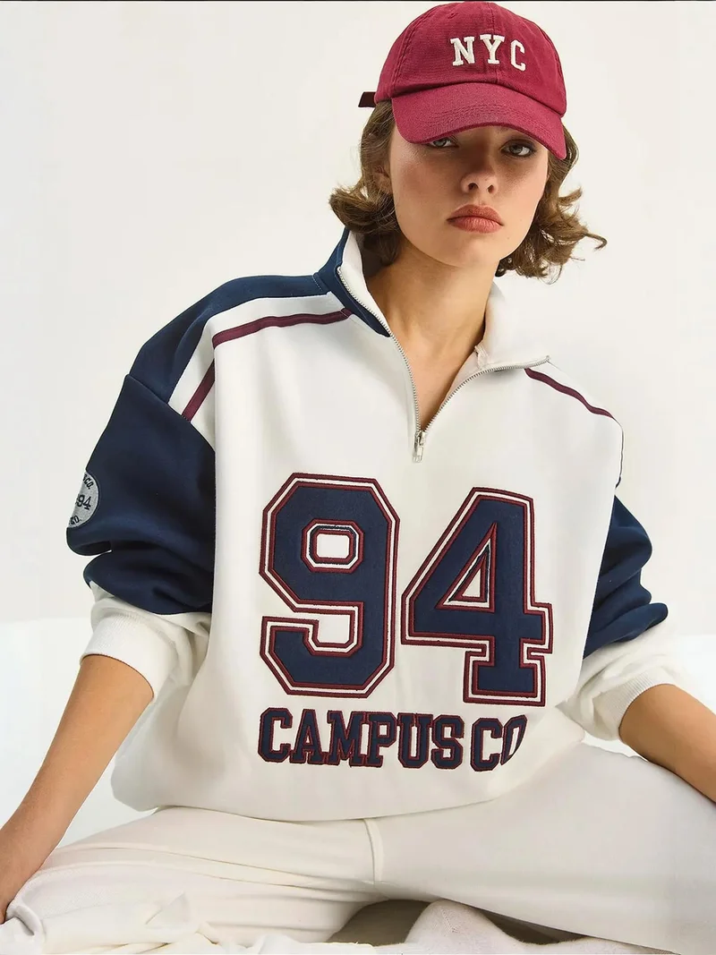 LUCCI Embroidered Crew Neck Zip-Up Sweatshirt