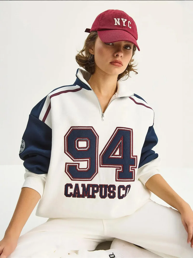 Bianco Lucci Ivory Natural LUCCI Embroidered Crew Neck Zip-Up Sweatshirt for Women | Best Price UAE