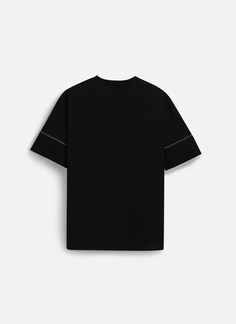 Snitch Black Black Graphic Half Sleeve Oversized Streetwear T-Shirt for Men | Best Price UAE