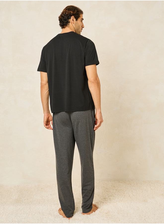 Styli - Slogan Print T-Shirt & Solid Pyjama Set - Image 1