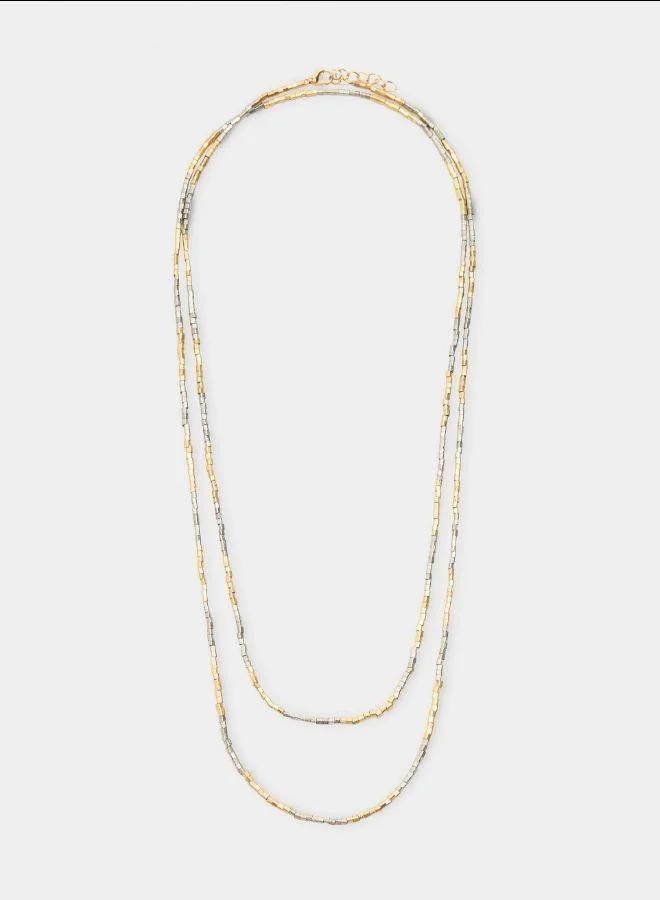 بارفوا عقد ثنائي اللون مع لفتين ذهبية