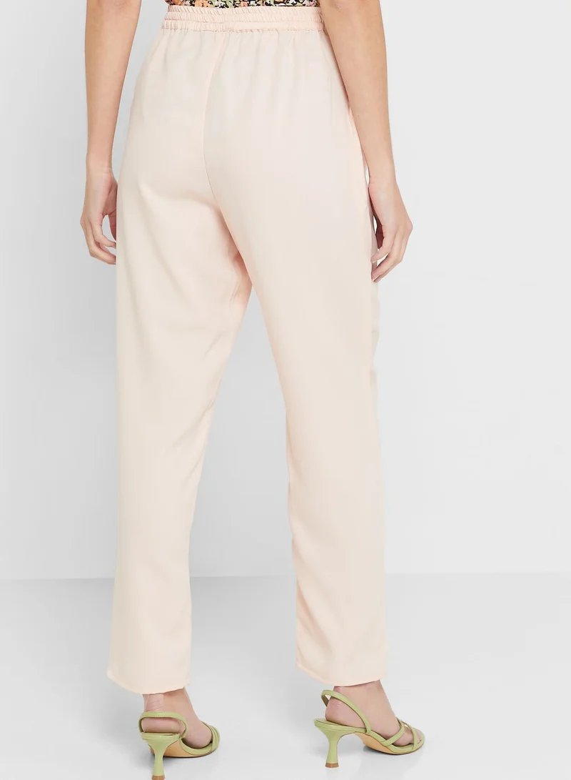 Ginger Pegged Pants With Elasticated Waist And Tie Up