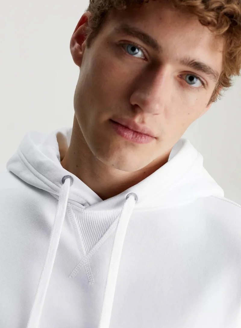 Calvin Klein Jeans Bright White Cotton Badge Hoodie for Men | Best Price UAE