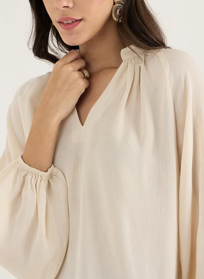 Femmella Femmella Textured Balloon Sleeve V-Neck Top