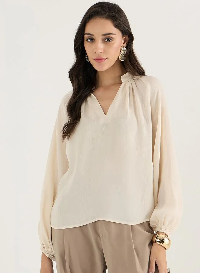 Femmella Femmella Textured Balloon Sleeve V-Neck Top