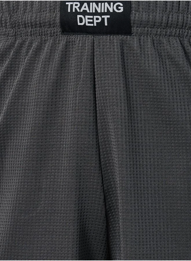 Styli Mesh Insert Oversized Training Shorts with Badge Detail